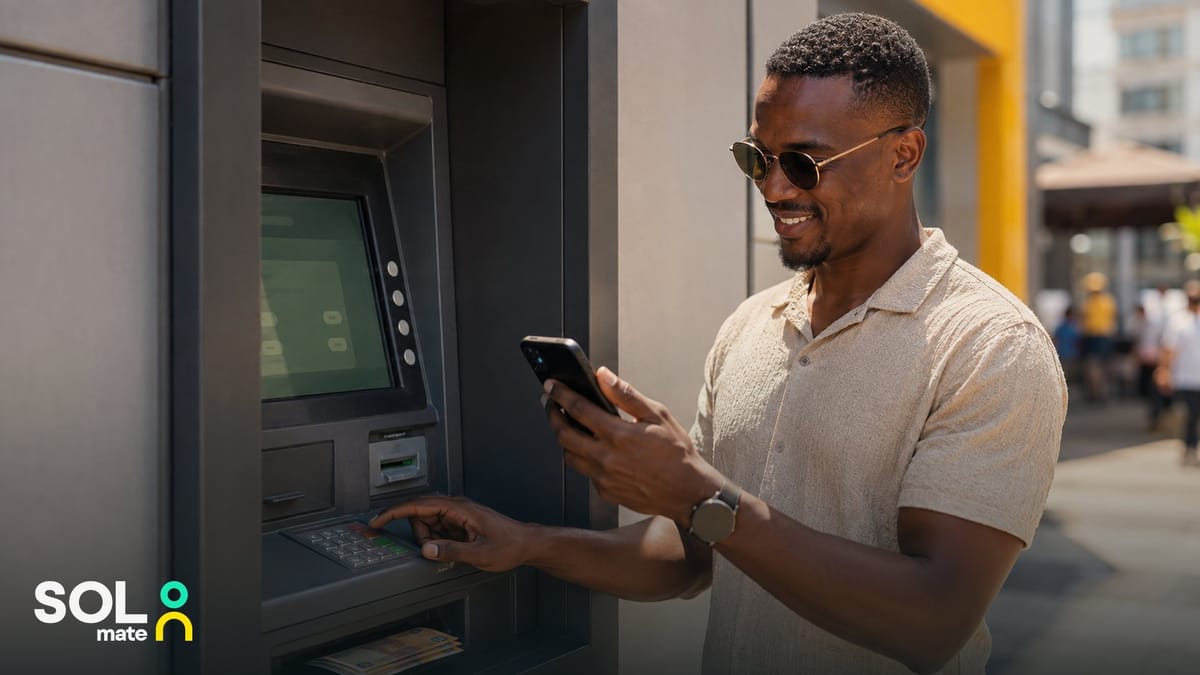 Withdrawing money without a card in South Africa — a man using his phone at an ATM instead of a bank card